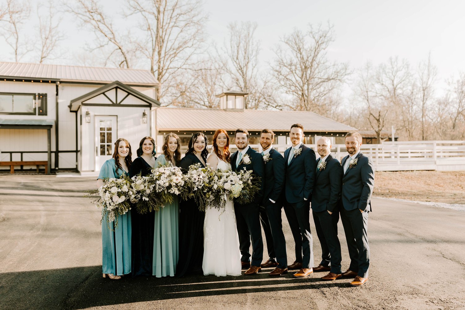 bride and groom with wedding party
