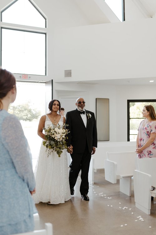 bride's father walking her down aisle
