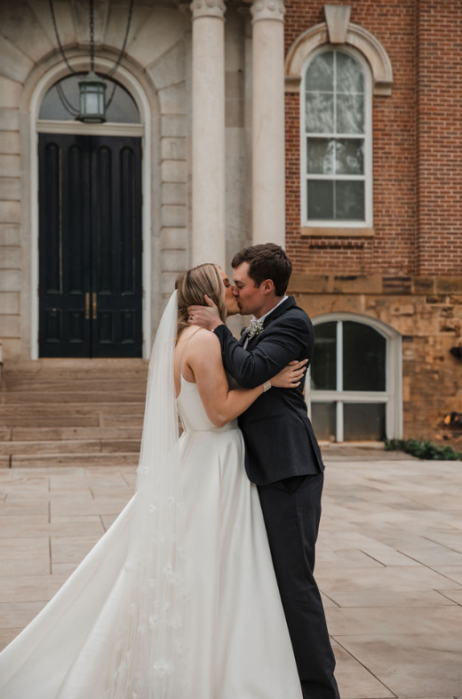 bride and groom kissing