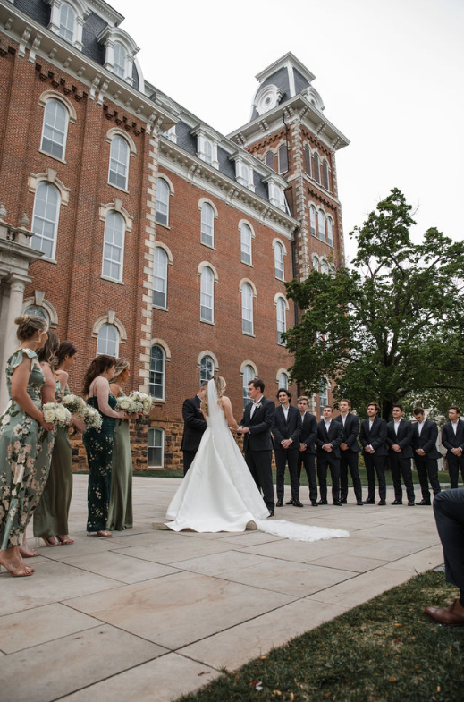 outdoor wedding in front of historic building