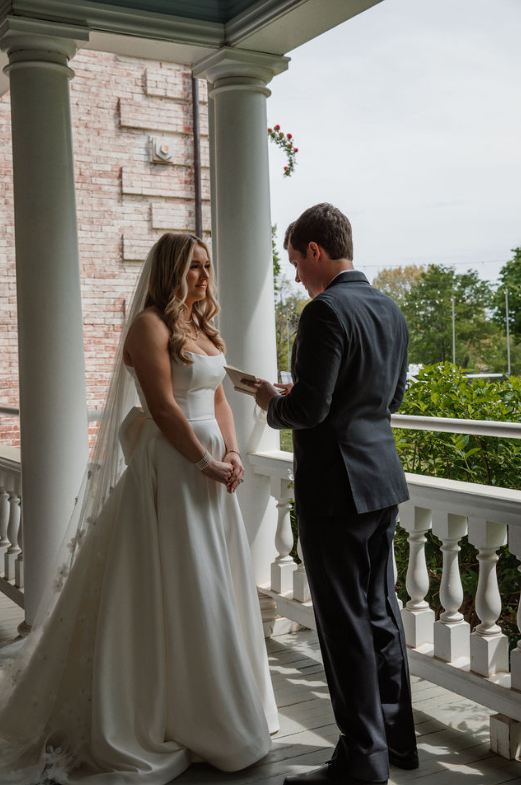 groom reading letter from bride